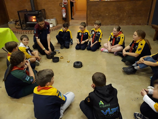 Ben Okley leading a junior Scout troop's activities